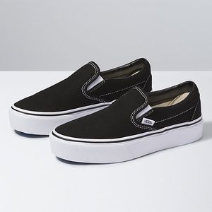 Vans black slip-ons. Never worn!